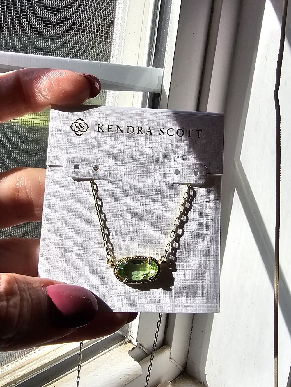 Kendra Scott Gold Necklace with Light Green Oval Stone